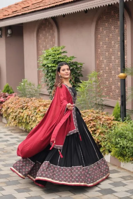 Ajrakh and gamthi work with mirror lace work Navratri lehenga choli with dupatta